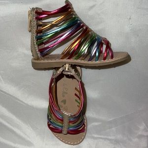 Brand-new Olive & Edie rainbow gladiators toddler size 5.